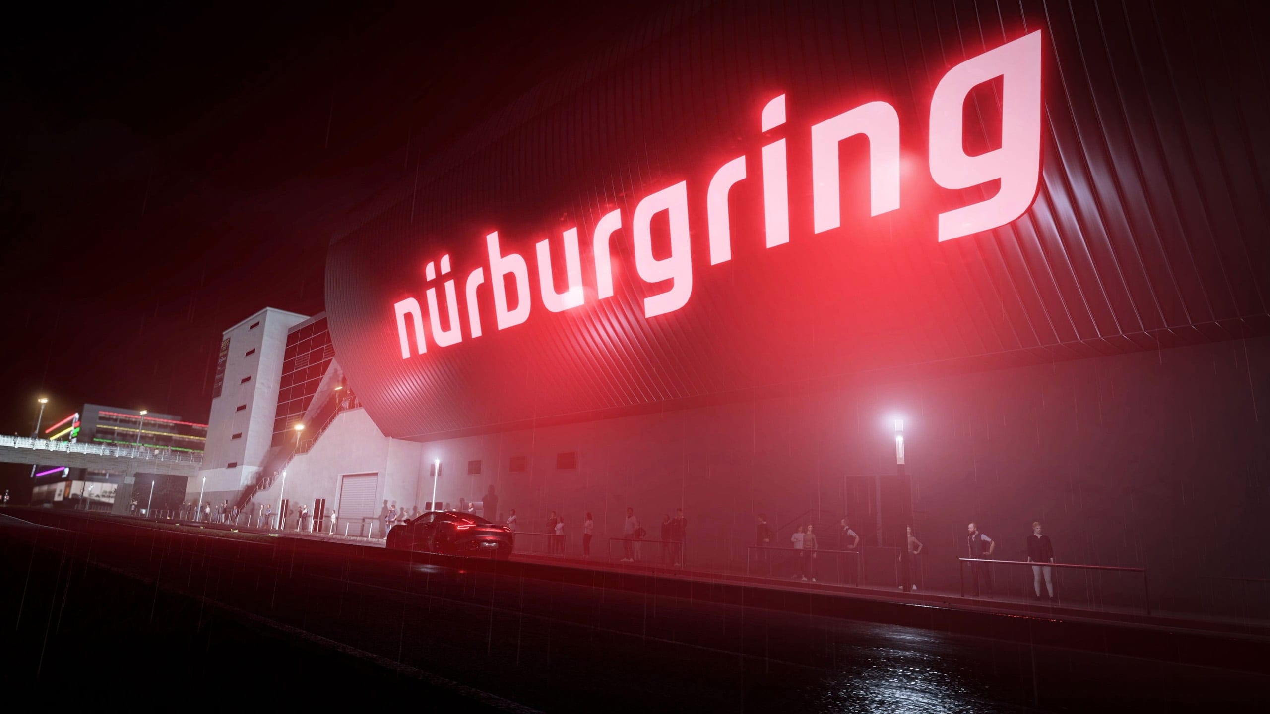 Une voiture devant l'enseigne lumineuse du Nürburgring, de nuit sous la pluie, dans le mode Free Roam d'Assetto Corsa EVO